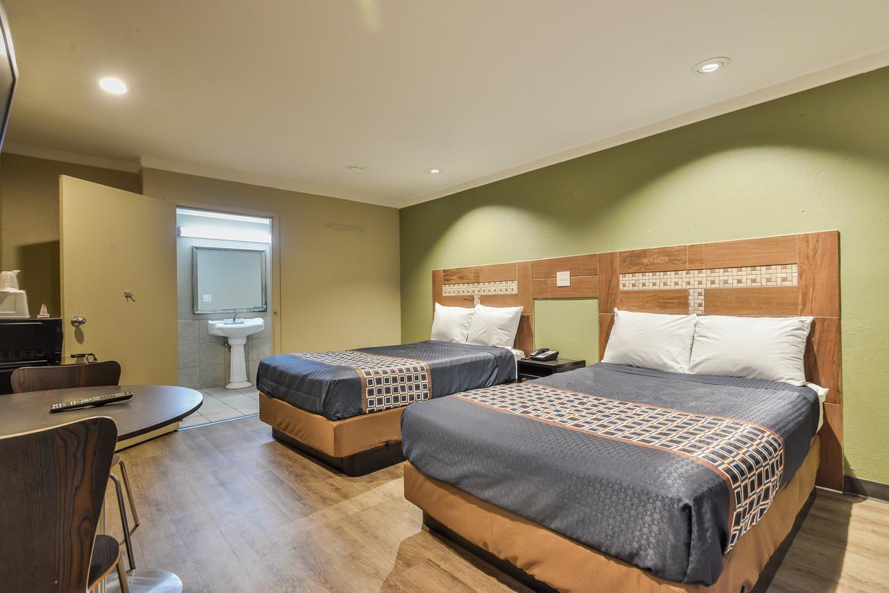 Budgetel Inn And Suites Raleigh Bagian luar foto