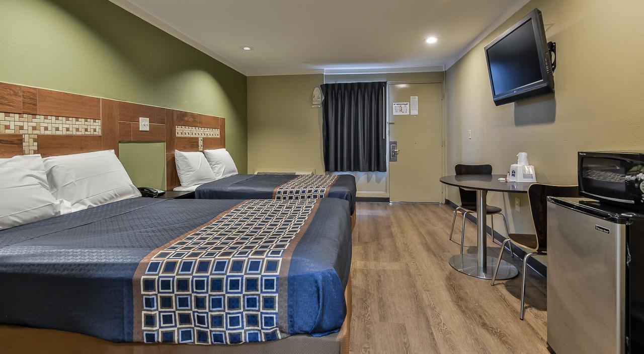 Budgetel Inn And Suites Raleigh Bagian luar foto