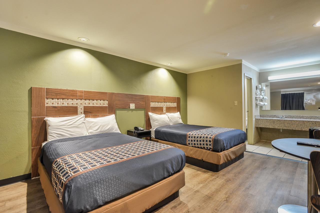 Budgetel Inn And Suites Raleigh Bagian luar foto